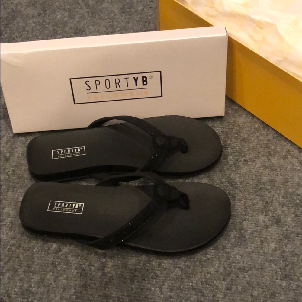 Black yellow box flip flops